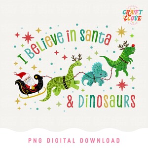May include: A whimsical illustration features Santa Claus in a sleigh pulled by three dinosaurs. The text reads "I Believe in Santa & Dinosaurs" in colorful letters, surrounded by stars and dots. A festive design for the holiday season.