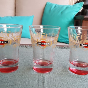 Vintage Martini glasses with birthday numbers and red background