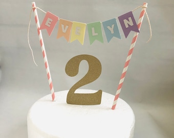 Pastel rainbow cake bunting and glitter age. Rainbow Cake topper decoration