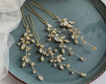 Gouden strass bruidshaarspelden, iets blauws