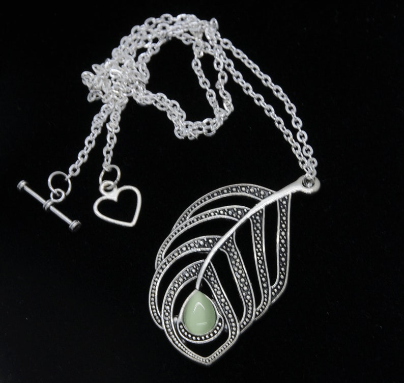 DIY jewelry pendant kit with beads and accessories identical to the photo