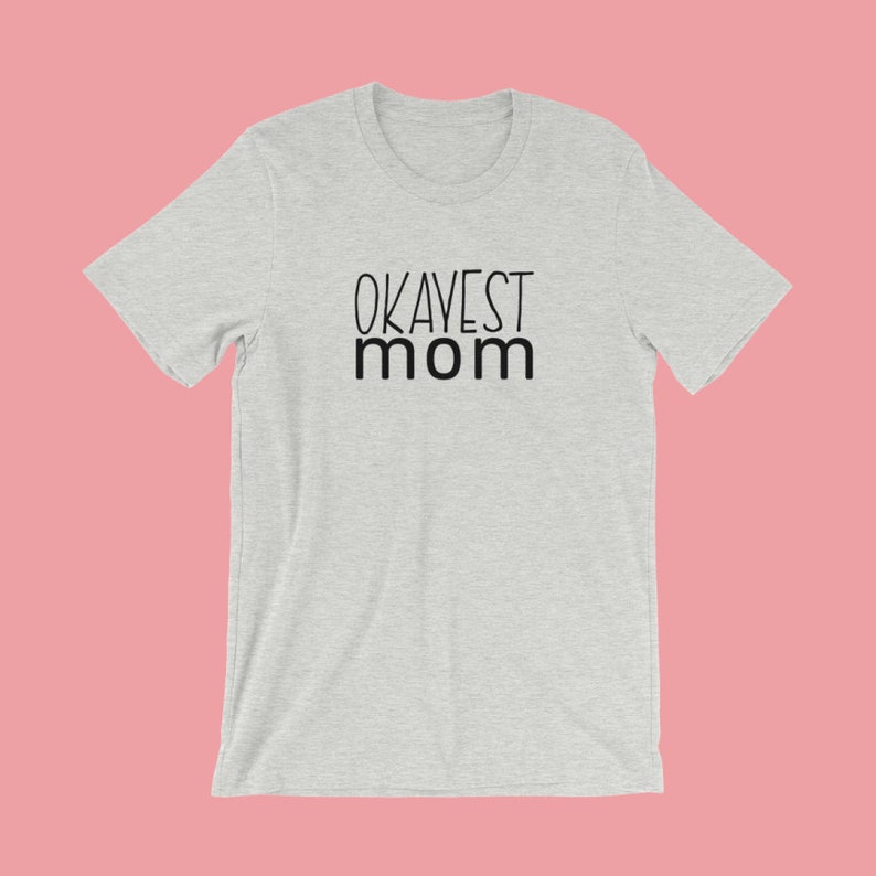 Okayest Mom logo tee with pink background