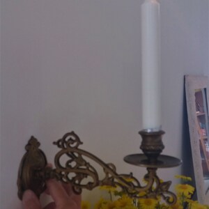 Two Antique Wall Swing Candlestick Holders