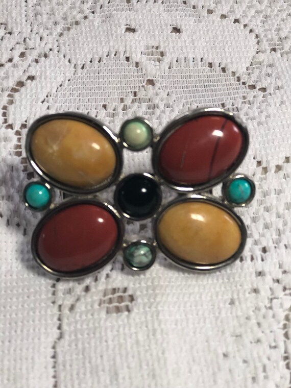 Terry Stack belt buckle