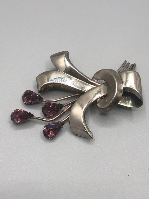 Sterling brooch with glass amethyst color stones - image 2