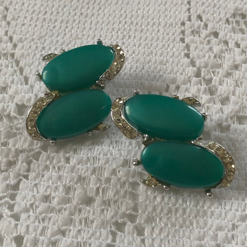 Vintage green thermoset and rhinestone clip on earrings