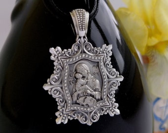 Silver pendant of the Virgin of Pochaev