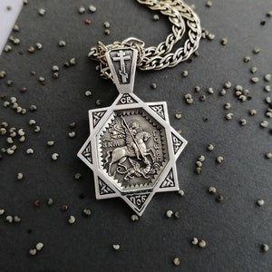 Silver pendant of Saint George the Victorious