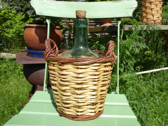 Antique Vieux Ballon à vin en verre, vert tressé dans le panier