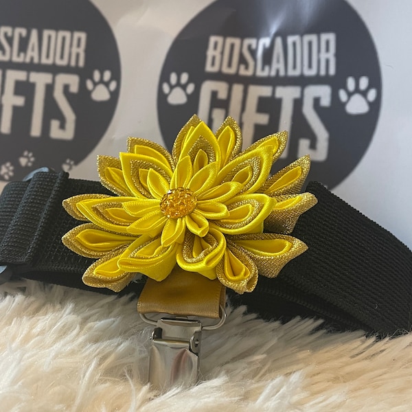 Folded ribbon style flower made with yellow and gold ribbon, centre piece, Dog Show exhibitor number ring clip with armband finishing