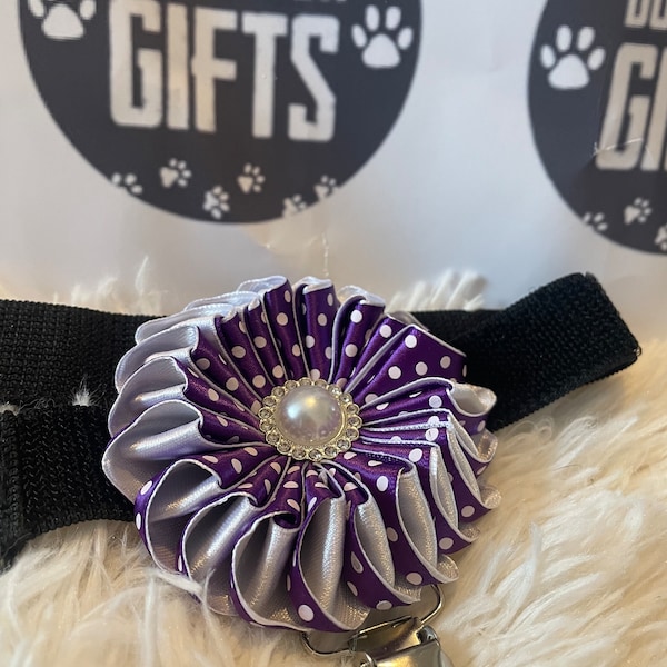 Folded rosette style flower made with purple polka dot ribbon, centre piece, Dog Show exhibitor number ring clip with armband finishing