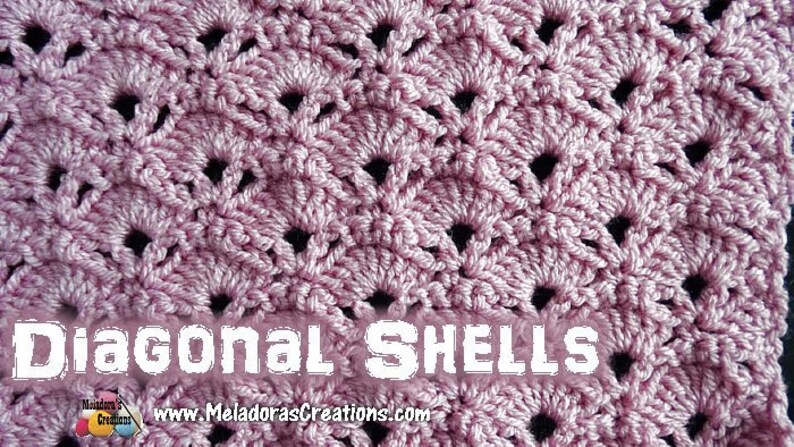 May include: A close-up of a pink crocheted fabric with a diagonal shell stitch pattern. The fabric has a textured look and feel. The text "Diagonal SHELLS" is visible at the bottom of the image.
