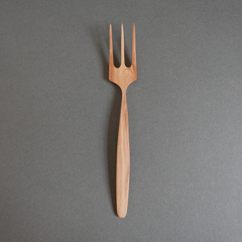 Plum wood hand carved cooking and serving fork