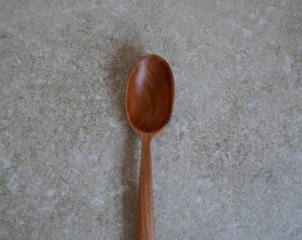 Medium plum wood hand carved spoon 7 inch (18 cm)