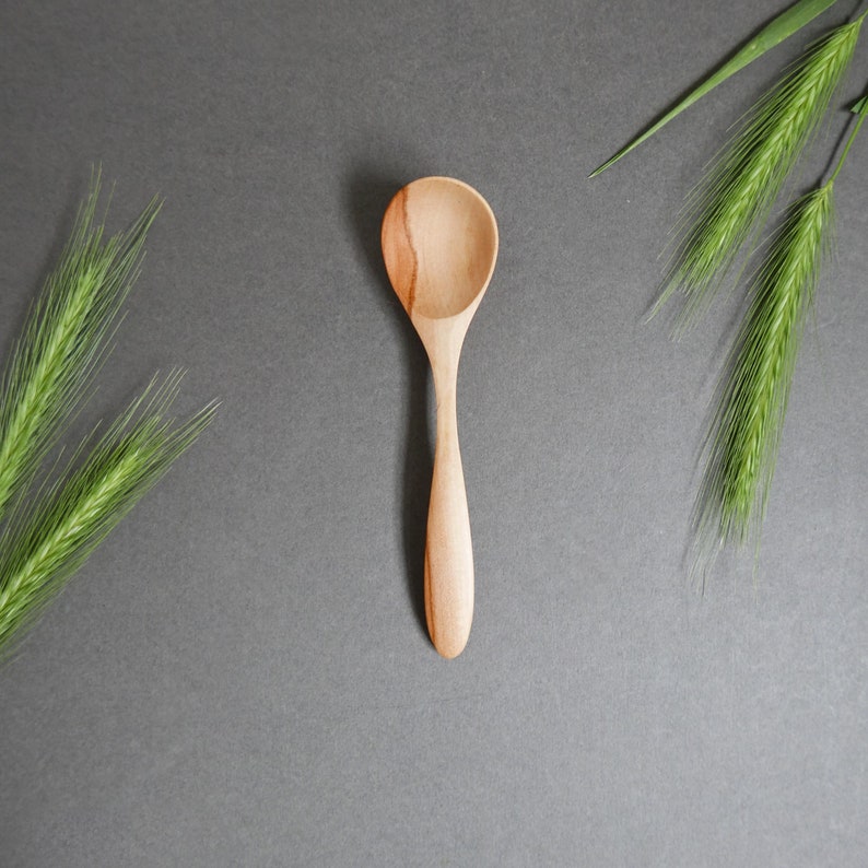 Wooden spoon hand carved of plum