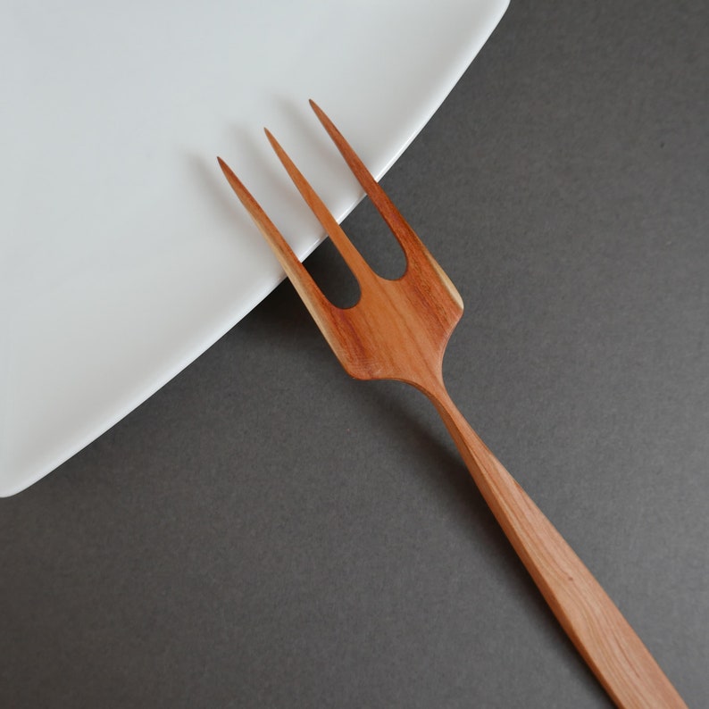 Plum wood hand carved cooking and serving fork