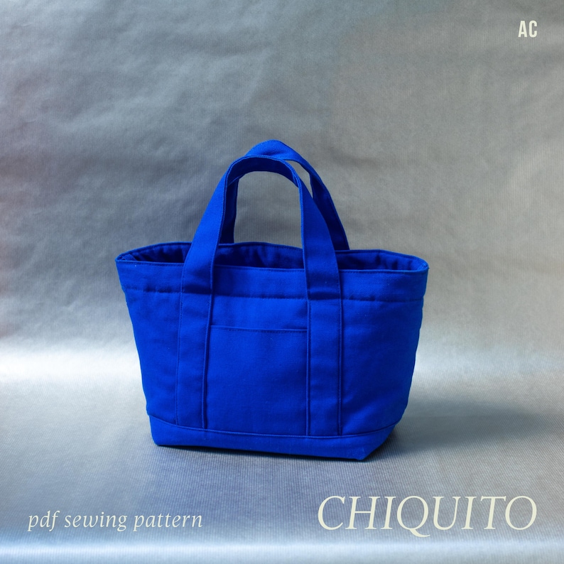May include: A vibrant blue tote bag featuring two sturdy handles, a structured rectangular base, and a front exterior pocket. The text AC is visible in the top right corner, and the text pdf sewing pattern CHIQUITO is at the bottom.