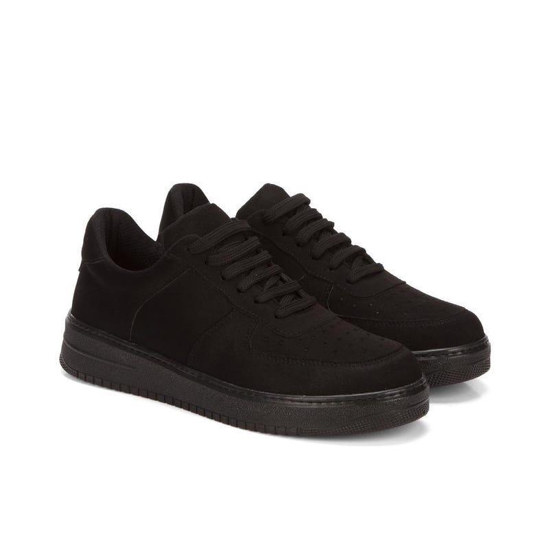 May include: A pair of black suede low-top sneakers with a white rubber sole.