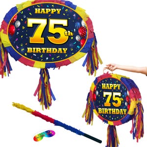 May include: A vibrant 75th birthday piñata with a matching stick. The piñata is round with a blue background and the words "Happy 75th Birthday" in gold. It is decorated with red, yellow, and blue fringe.