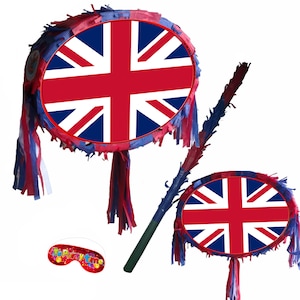 May include: Two red, white and blue Union Jack pinatas with a green and blue stick. The pinata has red, white and blue streamers. A white eye mask with the text "It's Party Time" in rainbow colours.