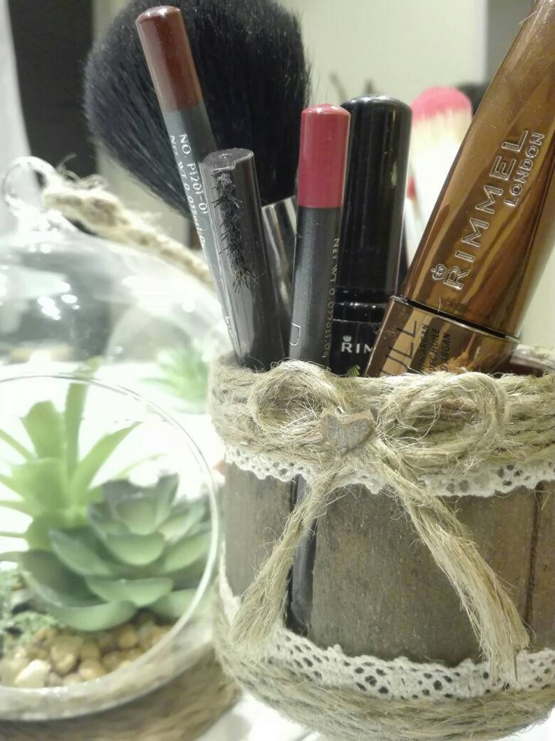 it will sublimate the piece you choose. Beautiful candle holder wood bark light hearted