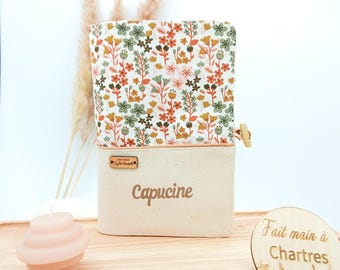 Personalized floral health record cover for baby with first name, wildflowers