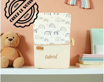 Personalized rainbow health record book cover with baby's name