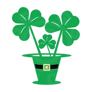 Może przedstawiać: Zielony kapelusz leprechauna z czarną wstążką i złotą klamrą, wypełniony trzema zielonymi czterolistnymi koniczynkami.