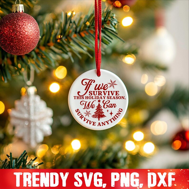 May include: White round Christmas ornament with red text that reads "If we survive this holiday season, we can survive anything". The ornament features a small Christmas tree and snowflakes.