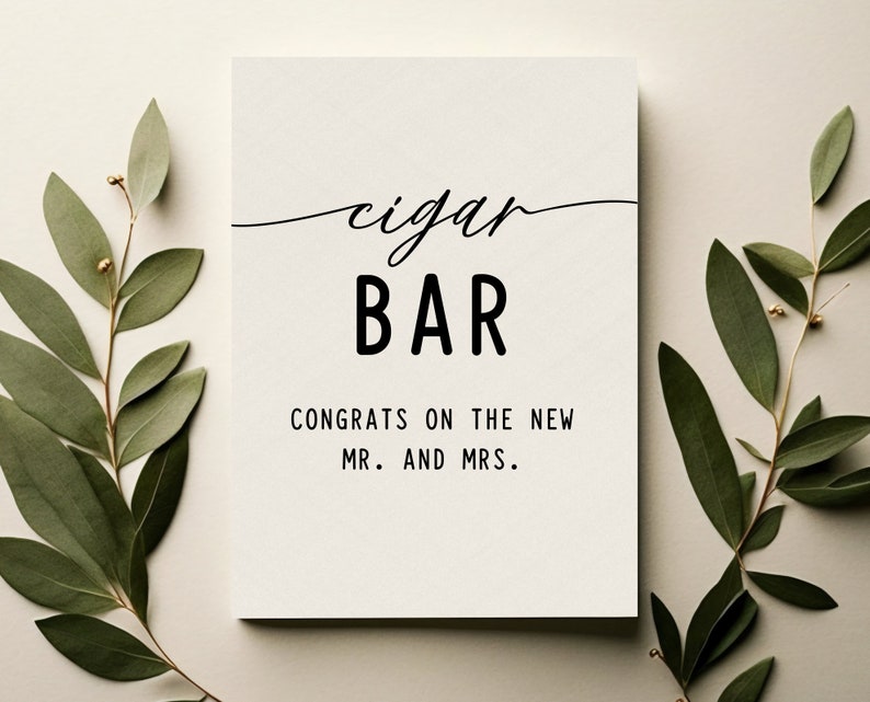 May include: A white card with black text that reads "cigar BAR CONGRATS ON THE NEW MR. AND MRS."