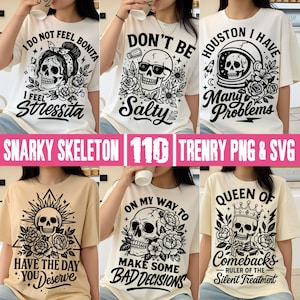 Peut inclure: Plusieurs t-shirts crème avec des motifs de crânes et des phrases. Les phrases incluent "I DO NOT FEEL BONITA I FEEL STRESSITA", "DON'T BE SALTY", et "HOUSTON I HAVE MANY PROBLEMS". D'autres chemises disent "HAVE THE DAY YOU DESERVE", "ON MY WAY TO MAKE SOME BAD DECISIONS", et "QUEEN OF COMEBACKS".
