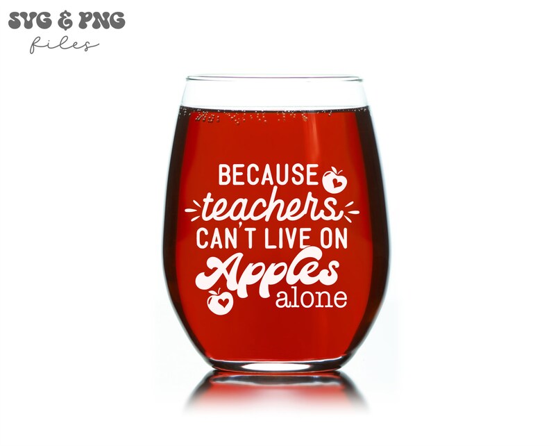 May include: A red wine glass with the text "Because teachers can't live on apples alone" and a small apple graphic.