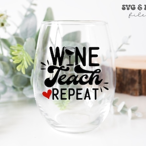 May include: A clear glass wine glass with a black and white design that says "Wine Teach Repeat" with a red heart.