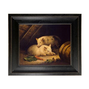 May include: A framed painting depicts two pigs resting in a barn. The pigs are light-colored with dark spots. A carrot, a turnip, and a green leaf are on the ground. A wooden barrel is visible in the background. The frame is black.