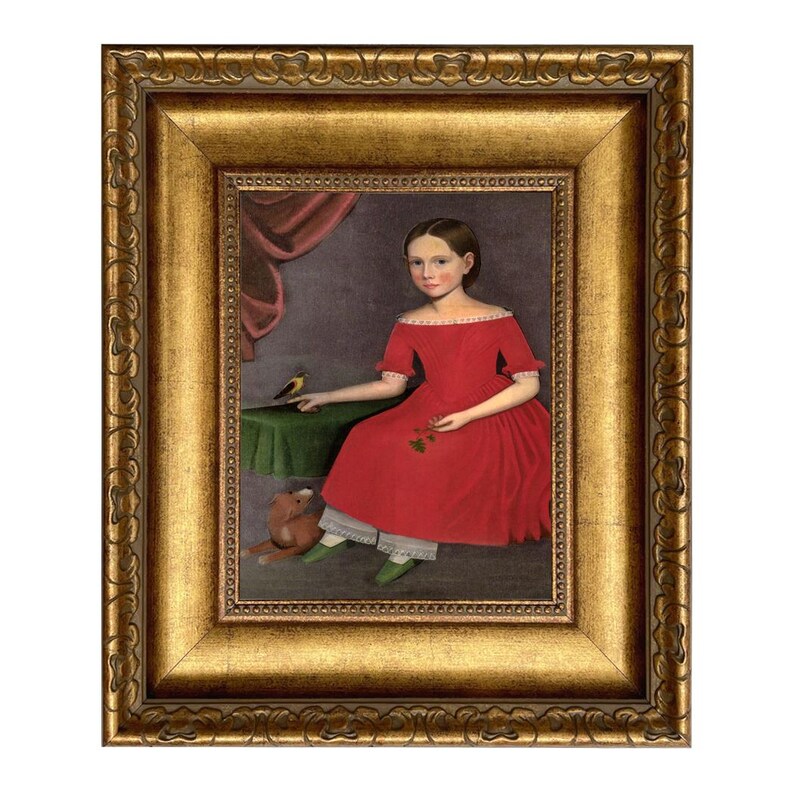 May include: A framed portrait of a young person in a red dress, seated with a small bird and a stuffed animal. The painting has a gold ornate frame and a dark background.