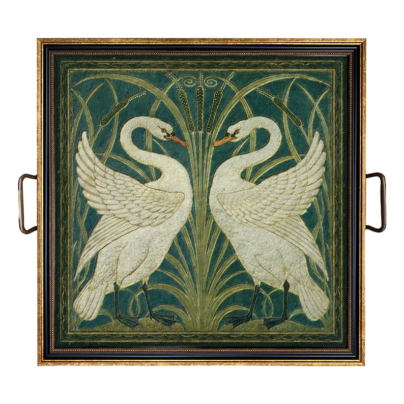 May include: A square serving tray featuring a decorative illustration of two white swans facing each other amidst green reeds and cattails. The tray has a black and gold frame with two metal handles attached to the sides for easy carrying.