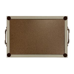 May include: Rectangular serving tray with a light beige frame and a brown interior. The tray has dark metal handles on each side and small, round, dark brown feet at each corner.