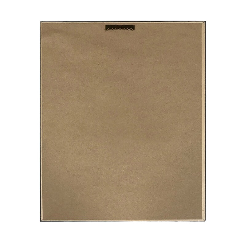 May include: The back of a framed picture with a brown cardboard backing. The frame is black and has a small metal hanger on the top.