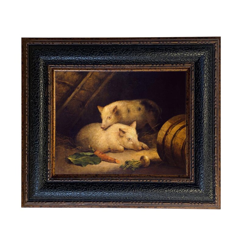 May include: A framed painting depicts two pigs in a barn setting. One pig is lying down, while the other is resting on top. A carrot and other vegetables are in the foreground. The painting is in a dark wooden frame.