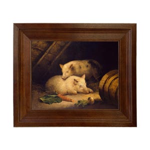 May include: A framed painting depicts two light-colored pigs resting in a barn setting. One pig is lying down, while the other is resting its head on the first. A carrot and a leaf are in the foreground. The painting is in a dark brown wooden frame.