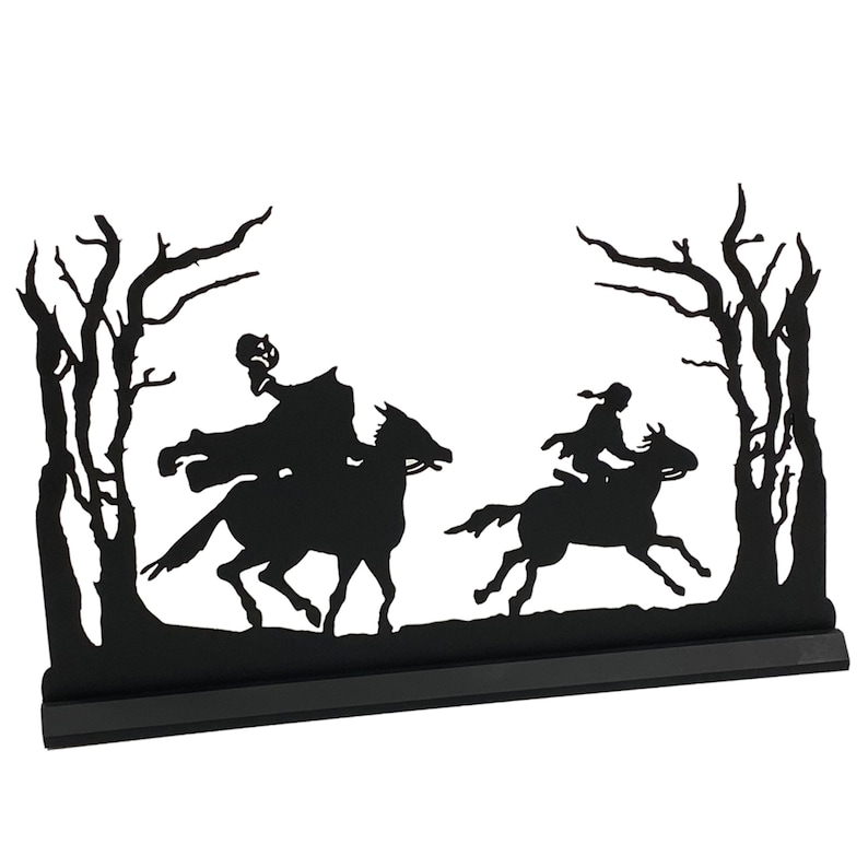 May include: Black metal silhouette of two figures on horseback riding through a forest. The figures are in the style of the Headless Horseman and Ichabod Crane from the legend of Sleepy Hollow.