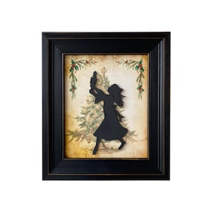 May include: A black silhouette of a girl holding a nutcracker in front of a vintage Christmas tree illustration. The image is framed in a black wood frame.