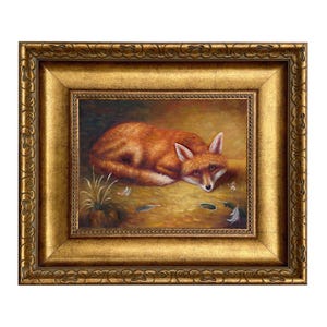 May include: A framed painting of a fox lying down, with reddish-orange fur and white accents. The artwork is set against a warm, earthy background with feathers and a small plant. The ornate gold frame adds a classic touch.