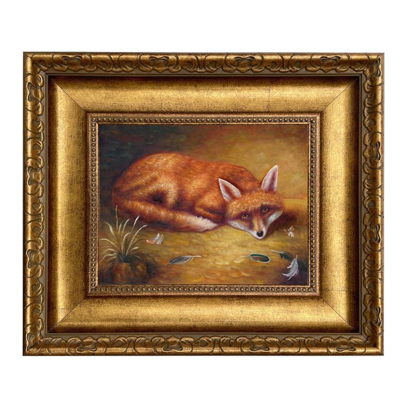 May include: A framed painting of a fox lying down, with reddish-orange fur and white accents. The artwork is set against a warm, earthy background with feathers and a small plant. The ornate gold frame adds a classic touch.