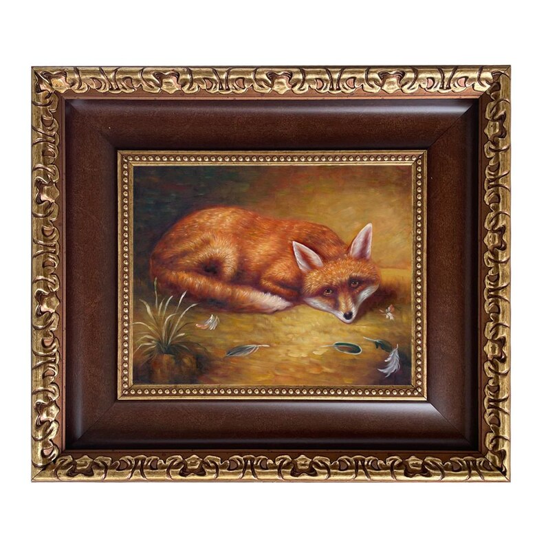 May include: A framed painting of a fox lying down, rendered in warm tones of orange, brown, and gold. The fox is the focal point, set against a soft, golden background. The frame is dark brown with ornate gold detailing.
