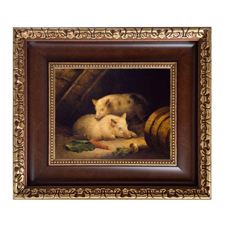 May include: A framed painting depicts two light-colored pigs in a barn setting. One pig is lying down, while the other is standing behind it. A carrot and a few green leaves are visible in the foreground. The frame is dark brown with gold accents.