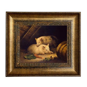 May include: A framed painting depicts two pigs in a barn setting. One pig rests on the hay, while another stands above it. A carrot and a leaf are visible. The frame is gold-colored with a detailed, ornate design.