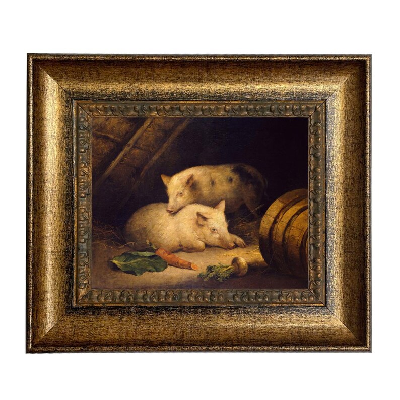 May include: A framed painting depicts two pigs in a barn setting. One pig rests on the hay, while another stands above it. A carrot and a leaf are visible. The frame is gold-colored with a detailed, ornate design.