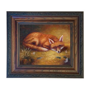 May include: A framed painting of a resting fox. The fox has reddish-orange fur and white accents on its face and ears. The painting has a warm color palette with a brown and gold background. Feathers and leaves are scattered around the fox.