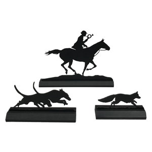 May include: Black metal silhouette set of a rider on horseback, a hound, and a fox. The figures are mounted on black bases.